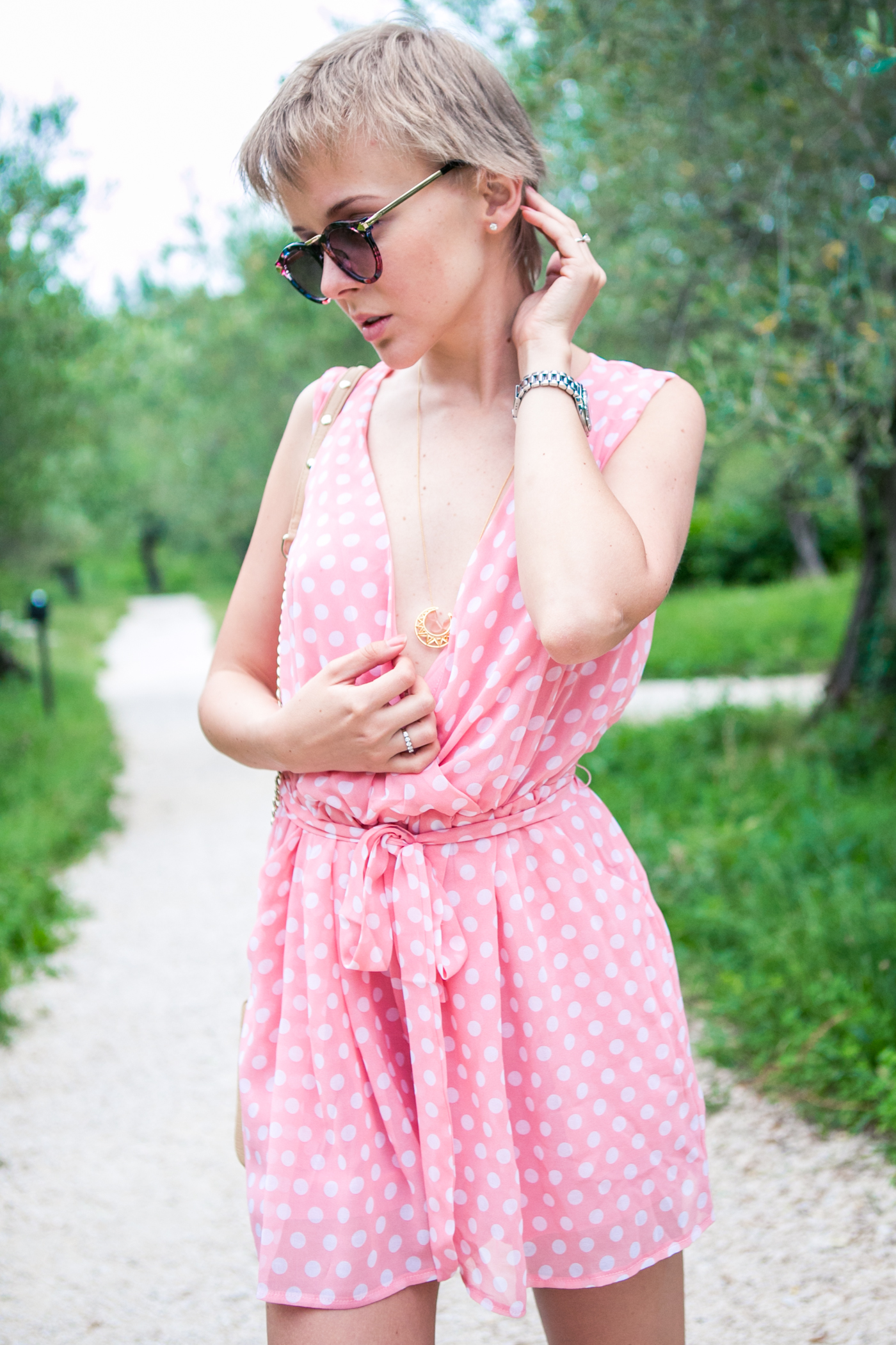 thecablook darya kamalova fashion blog street style sirmione italy verona jumpsuit rompers polka dots pixie cut short hair zanotti sandals rebecca minkoff bag vj style sunnies sunglasses outfit-133