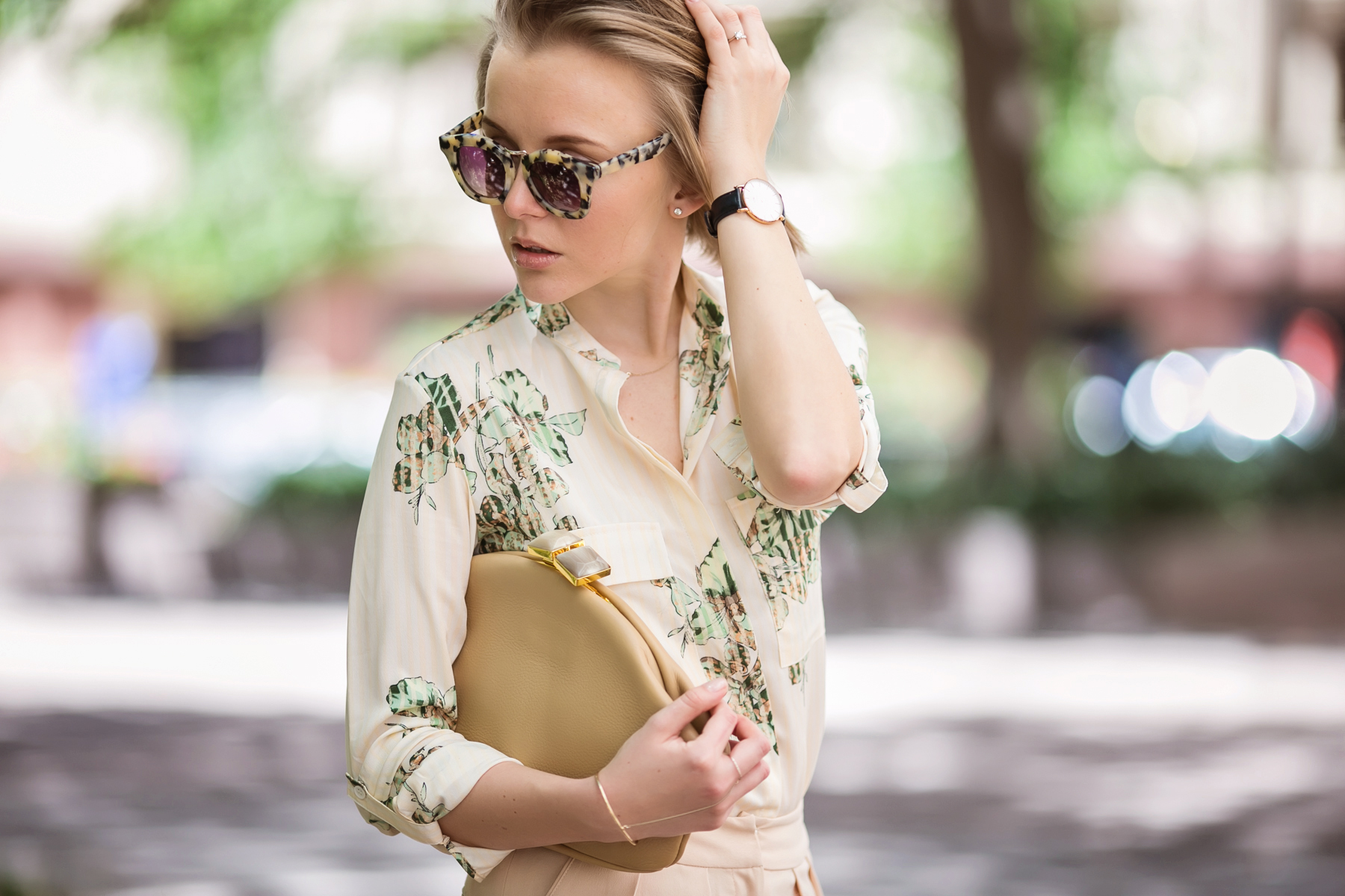 darya kamalova from thecablook in dallas texas is wearing beige pants and beige shirt with green leaves with marni retro ctutch and asos handmade sunglasses-32